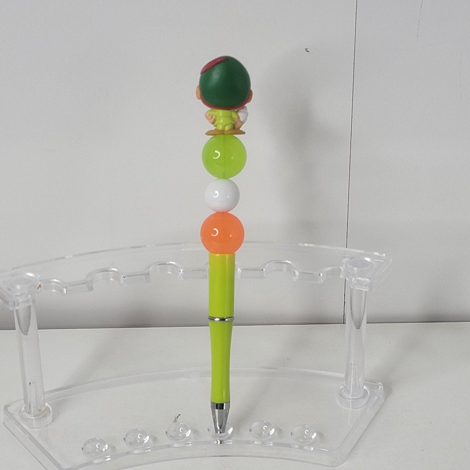 Disney Doorables Beaded Pen Peter Pan from Peter Pan Holding Ice Cream Cone